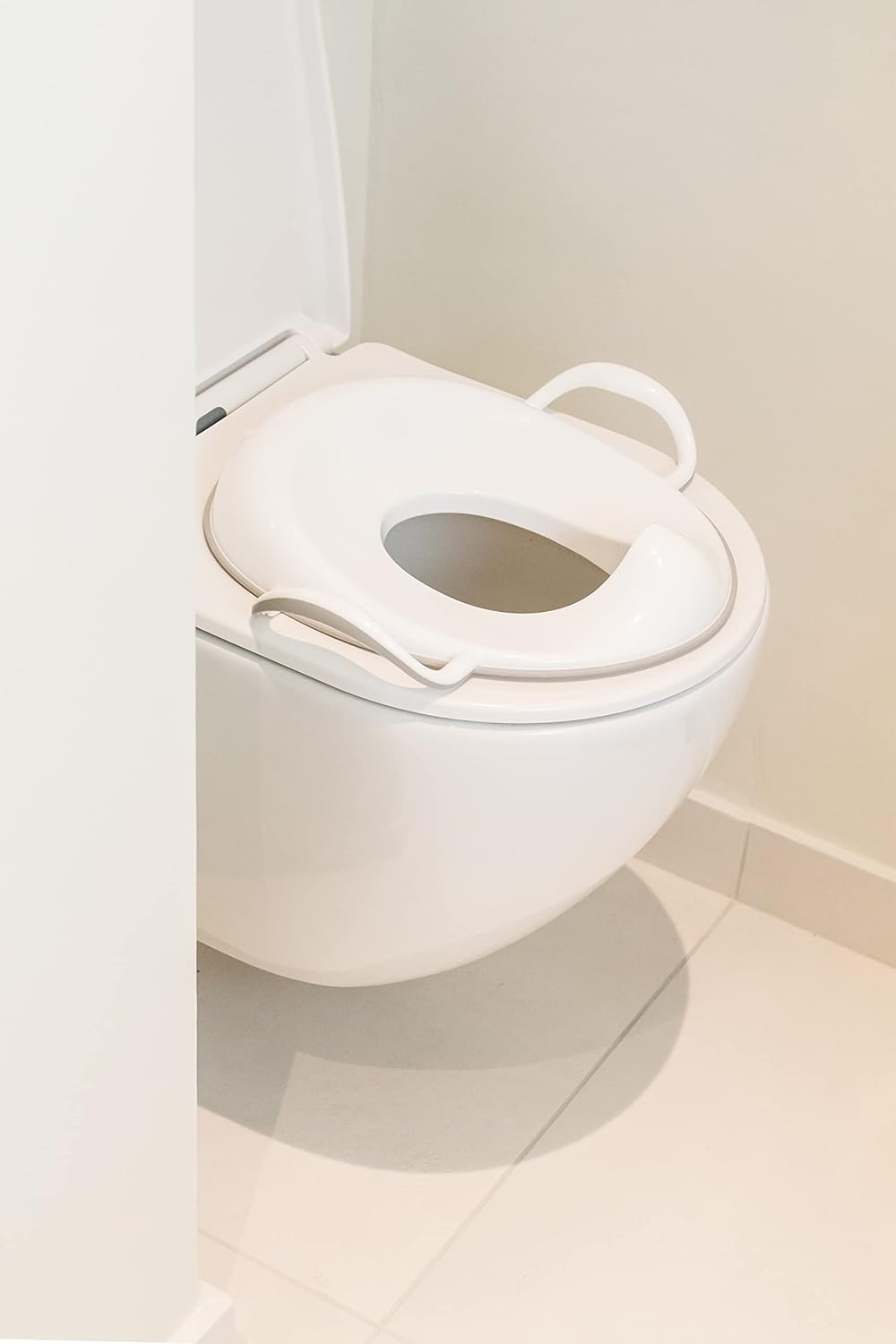 Reductor WC - Asiento inodoro para niños, con asas y con proteccion contra salpicaduras, Blanco, 10+ meses - Imagen 3